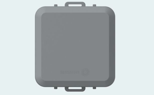 The Square Tracker Xtreme: a grey sealed enclosure with a strap loop moulded into the top and bottom edges for cable-tie or frame mounting, the Sensative logo across the lower face